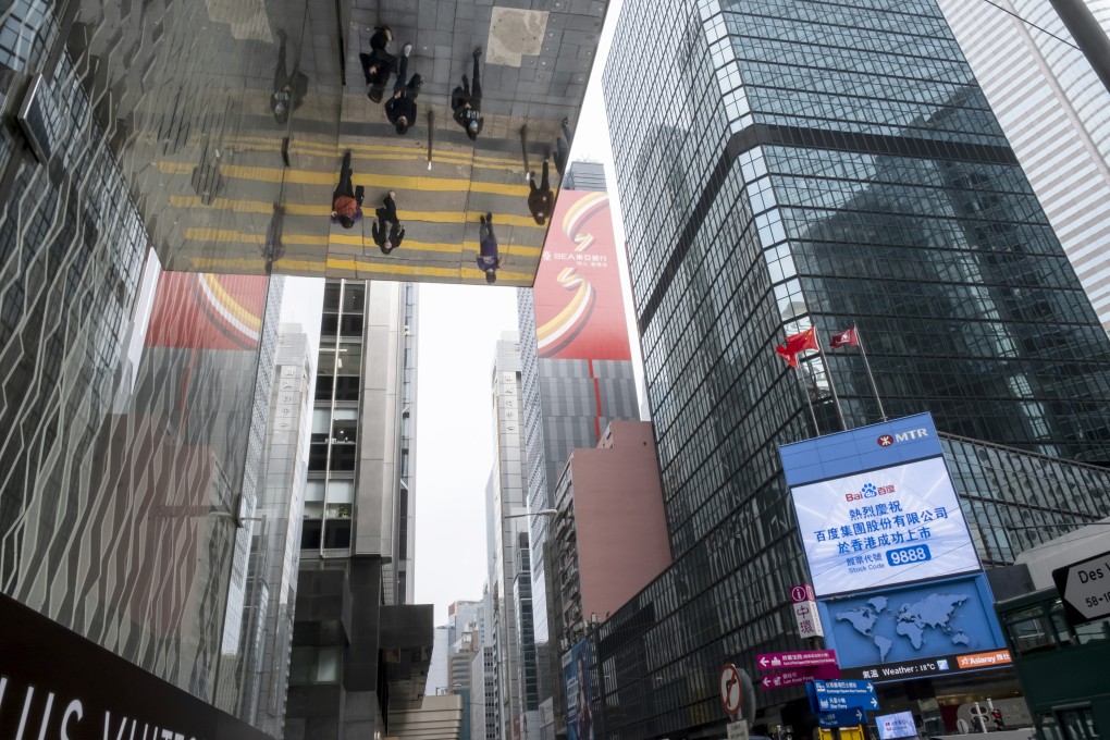 A screen shows a message marking the listing of Baidu in Hong Kong on March 23. Photo: Bloomberg