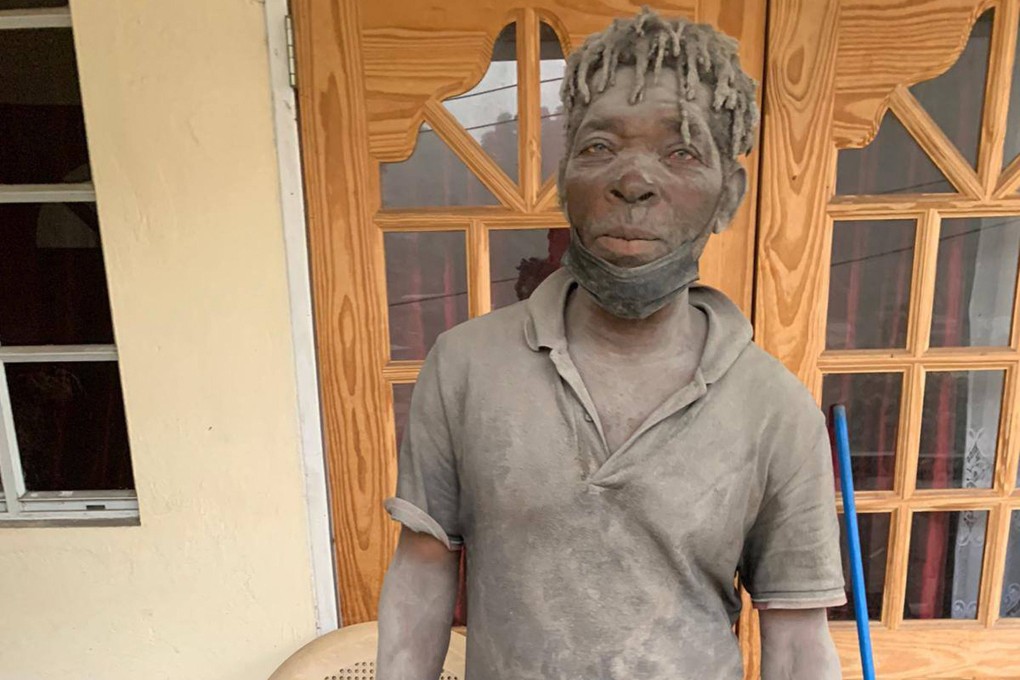 A volunteer covered in ash after the eruption of the La Soufriere Volcano in Saint Vincent. Photo: UWI Seismic Research Centre / AFP
