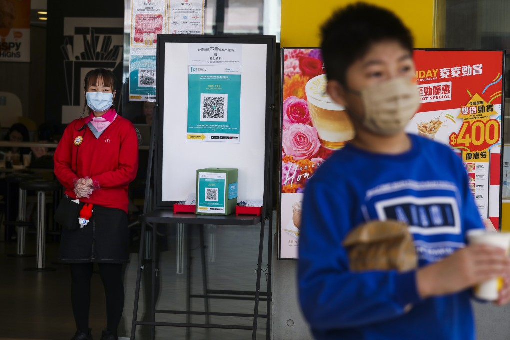 The government has made it mandatory for visitors to check into restaurants, cinemas, gyms and other businesses with the app or by providing their contact details to the venues. Photo: Nora Tam