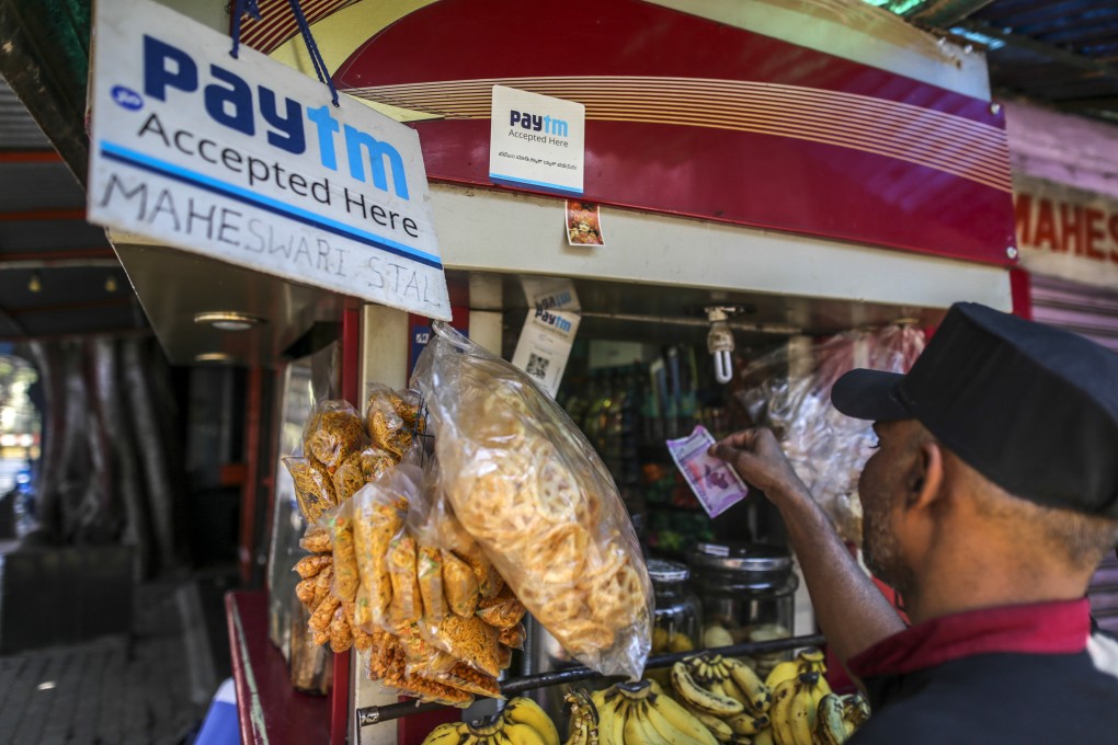 A shop in Bangalore, India, displays a sign it accepts the PayTM online method. Photo: Bloomberg