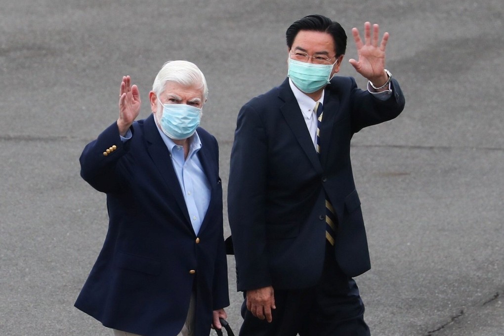 Former US senator Chris Dodd is met by Taiwan’s Foreign Minister Joseph Wu on his arrival in Taipei on Wednesday. Photo: Reuters