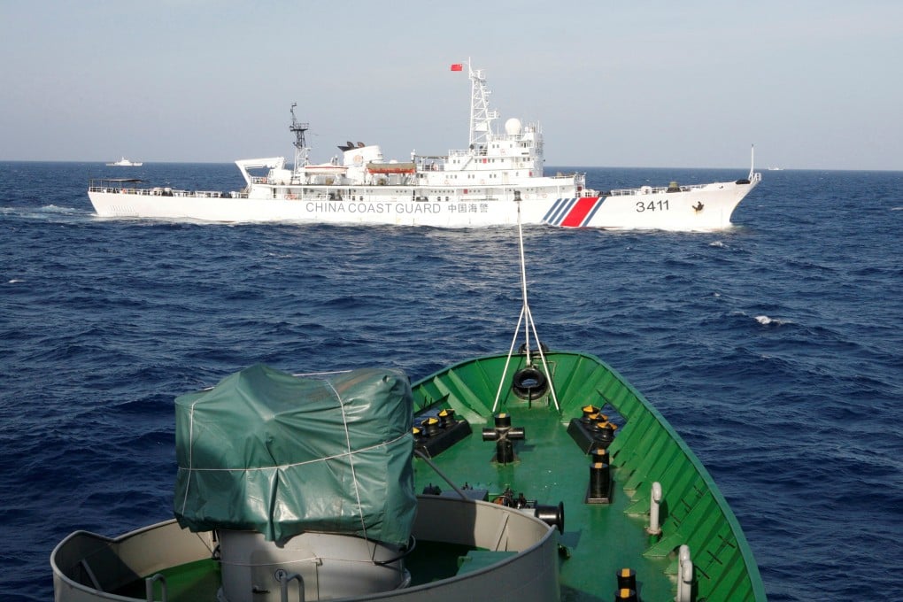A China Coast Guard ship is seen near a ship of the Vietnam Marine Guard in the South China Sea. File photo: Reuters