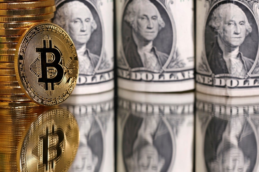 Representations of bitcoin and U.S. dollar banknotes are seen in this illustration taken on January 6, 2020. Photo: Reuters