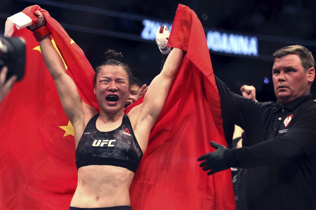 Zhang Weili celebrates her win by decision over Joanna Jedrzejczyk at UFC 248. Photo: AP