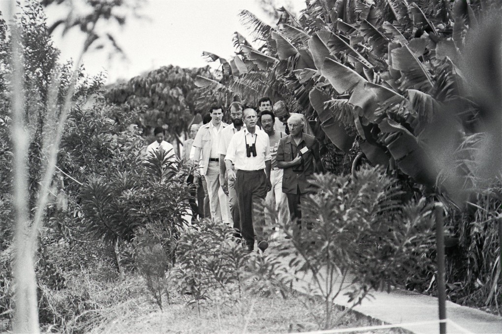 Prince Philip (centre) strolls through the wildlife reserves at Mai Po during his visit to Hong Kong in October 1986. As WWF president, he inaugurated the Mai Po wildlife education centre. Photo: SCMP