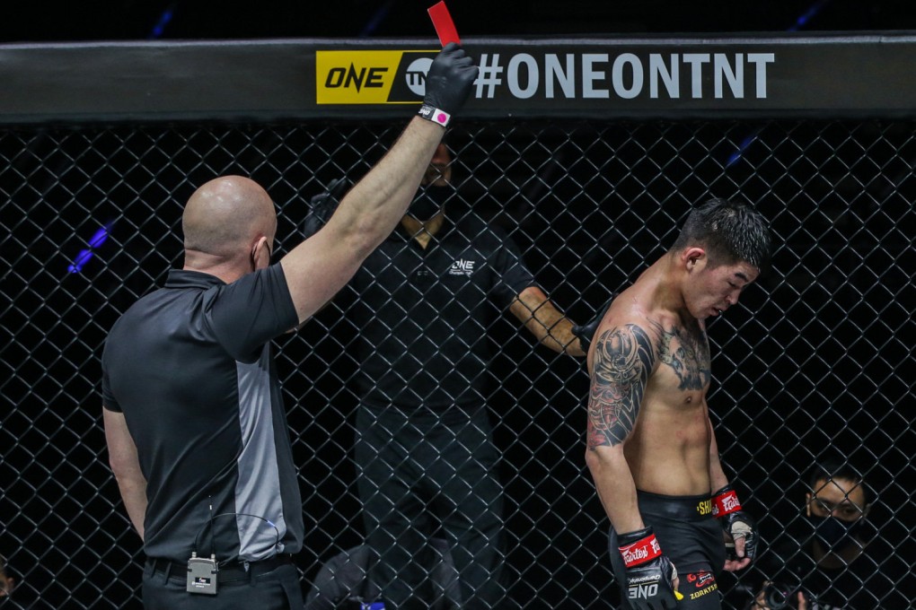 Shinechagtga Zoltsetseg walks off dejectedly after referee Olivier Coste shows him a red card at ONE on TNT 2. Photos: ONE Championship