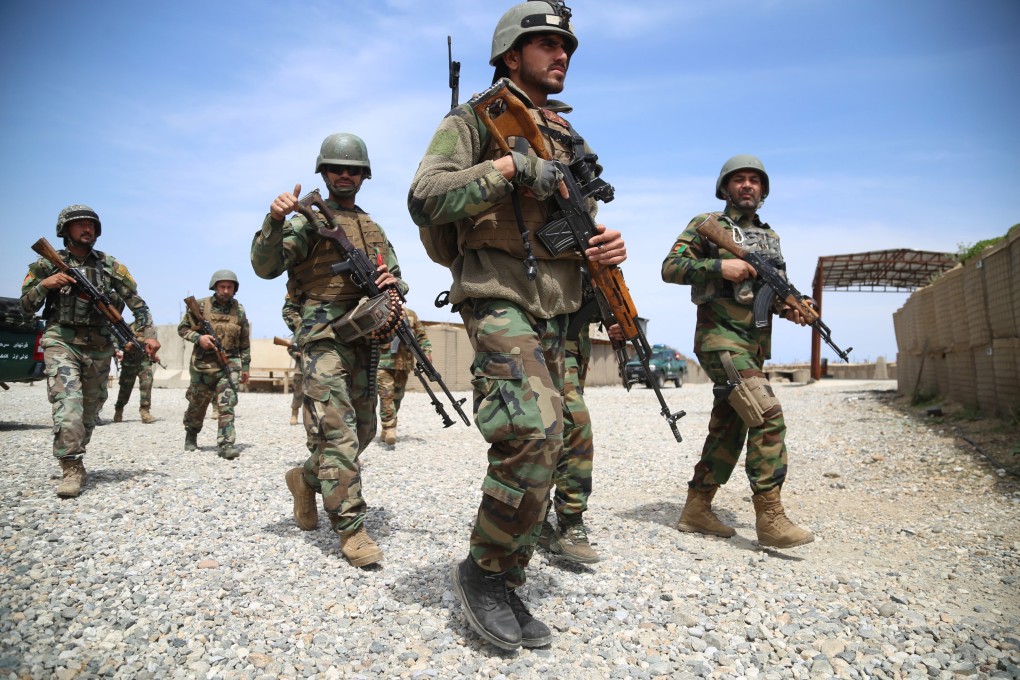 Afghan Army soldiers secure a military base that was previously in use by the US soldiers, in Haska Meyna district, Nangarhar province, Afghanistan on Wednesday. Photo: EPA-EFE