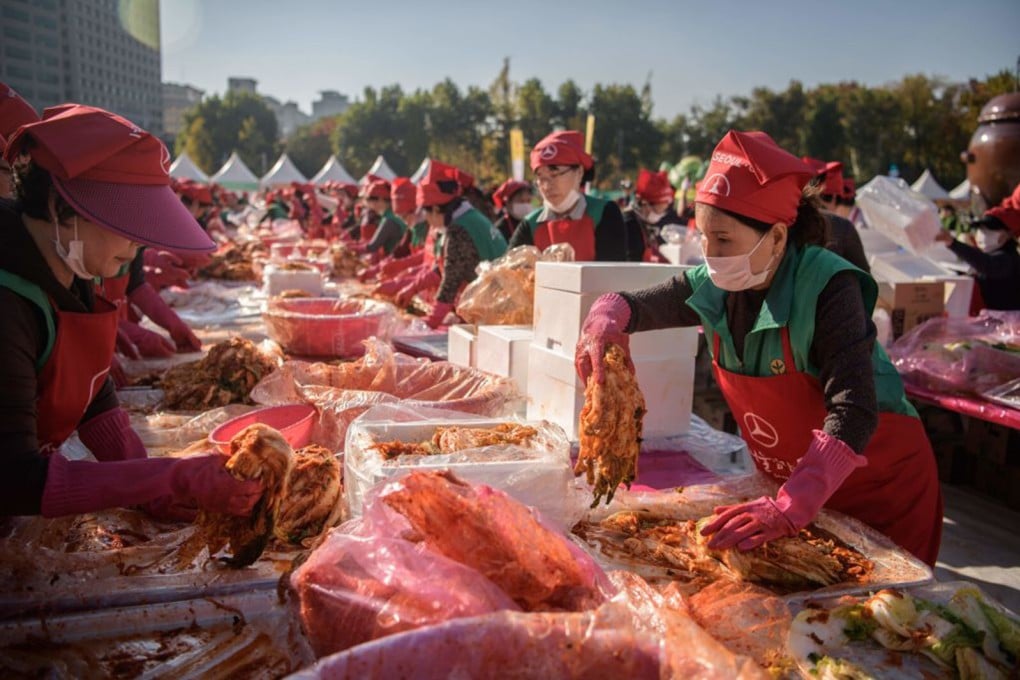 Volunteers take part in a kimchi making festival in Seoul. File photo: AFP via Getty Images/TNS