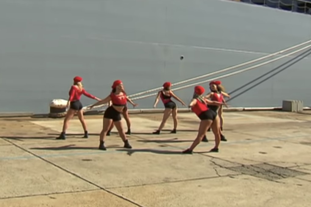 A dance troupe performs in front of a new naval supply vessel, causing controversy in Australia. Photo: Handout