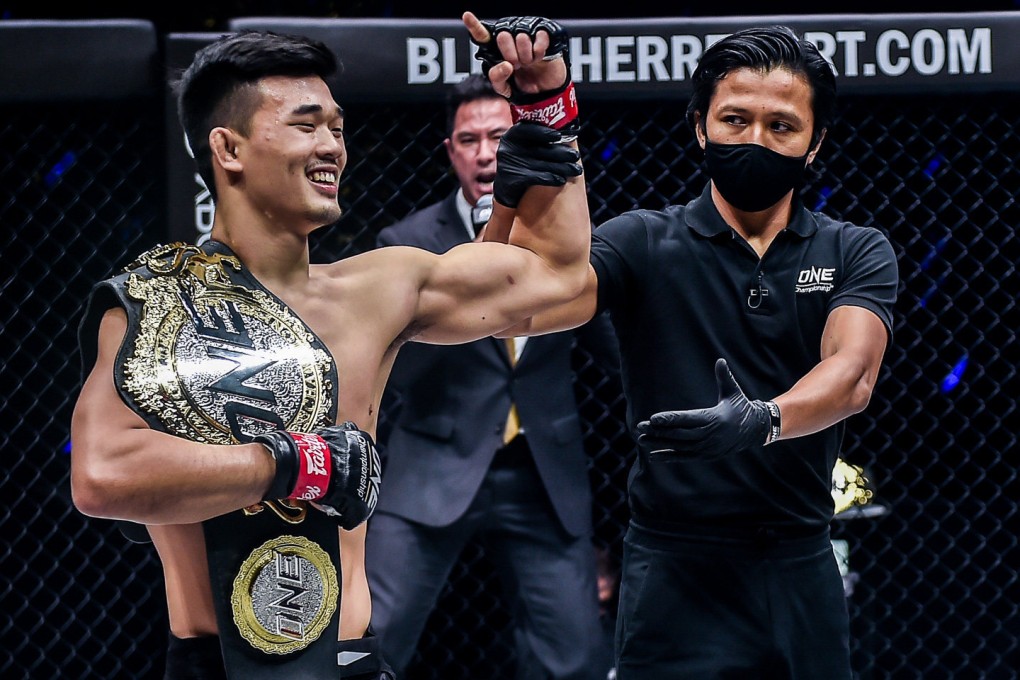 Christian Lee celebrates after retaining his lightweight title at ONE on TNT 2. Photos: ONE Championship