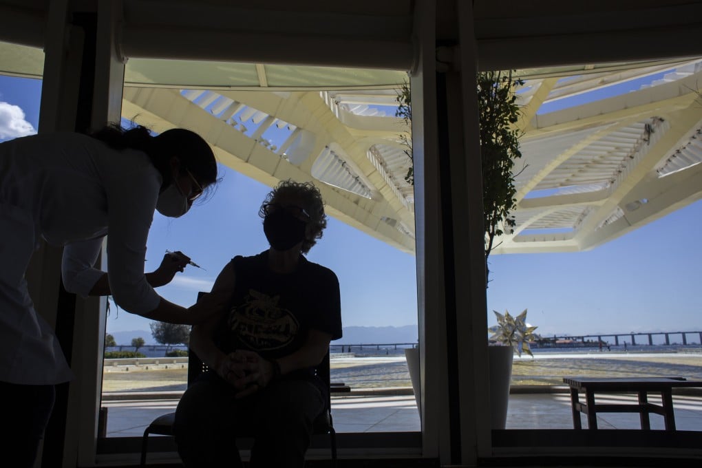 A woman gets a Covid-19 vaccine shot inside the Museum of Tomorrow in Rio de Janeiro, Brazil on April 1. Photo: AP