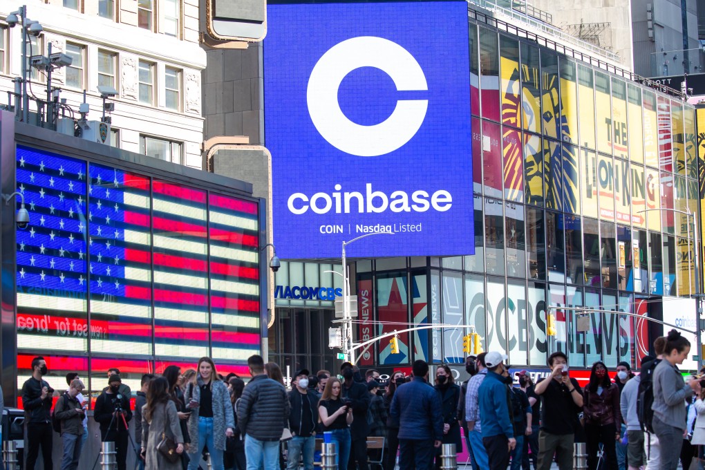 Monitors display Coinbase signage during the companys initial public offering (IPO) at the Nasdaq MarketSite in New York on April 14, 2021. Photo: Bloomberg