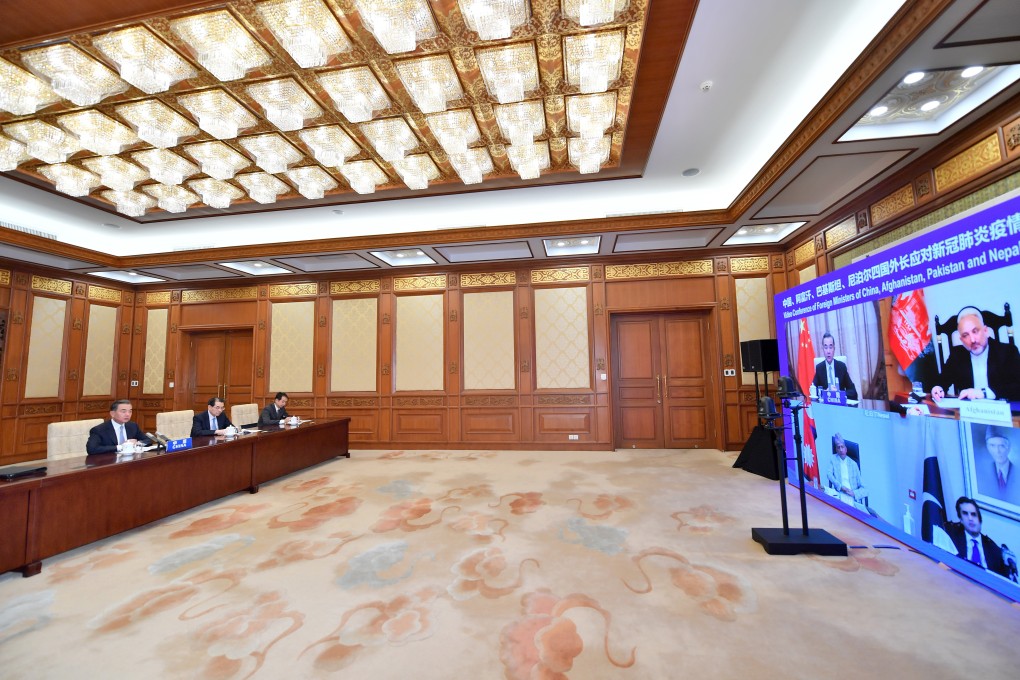 China’s Foreign Minister Wang Yi hosts a video conference with his counterparts from Afghanistan, Pakistan and Nepal in July 2020. Photo: Xinhua