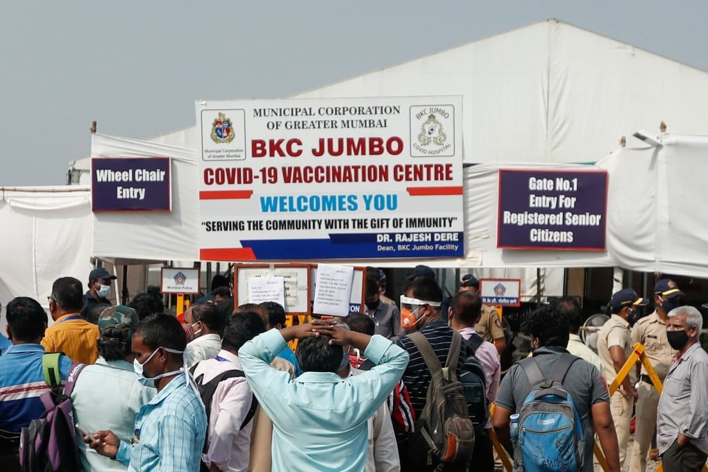 People at a Mumbai vaccination centre react after hearing news of a shortage in Covid-19 vaccine supplies. Photo: Reuters