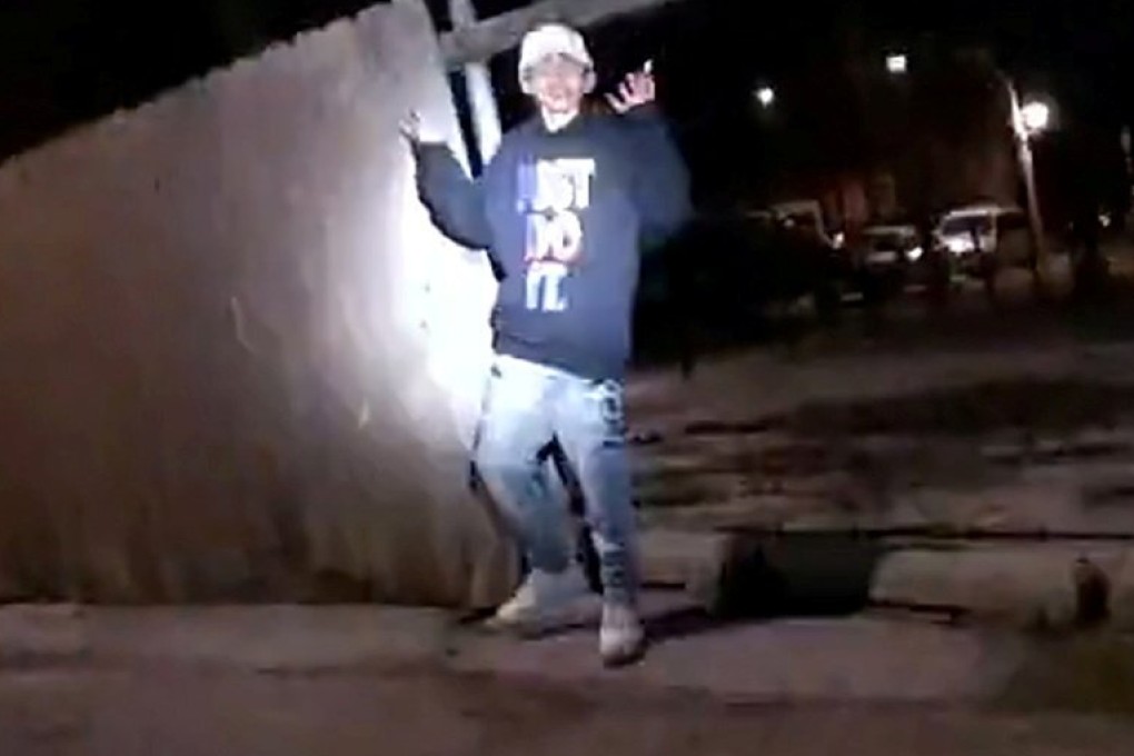 Adam Toledo, 13, holds up his hands a split second before he was shot by police in Little Village, a neighborhood on the West Side of Chicago, Illinois. Photo: Reuters
