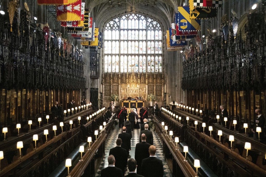 Prince Philip’s coffin is brought into St George’s chapel in Windsor Castle on Saturday. Photo: AP