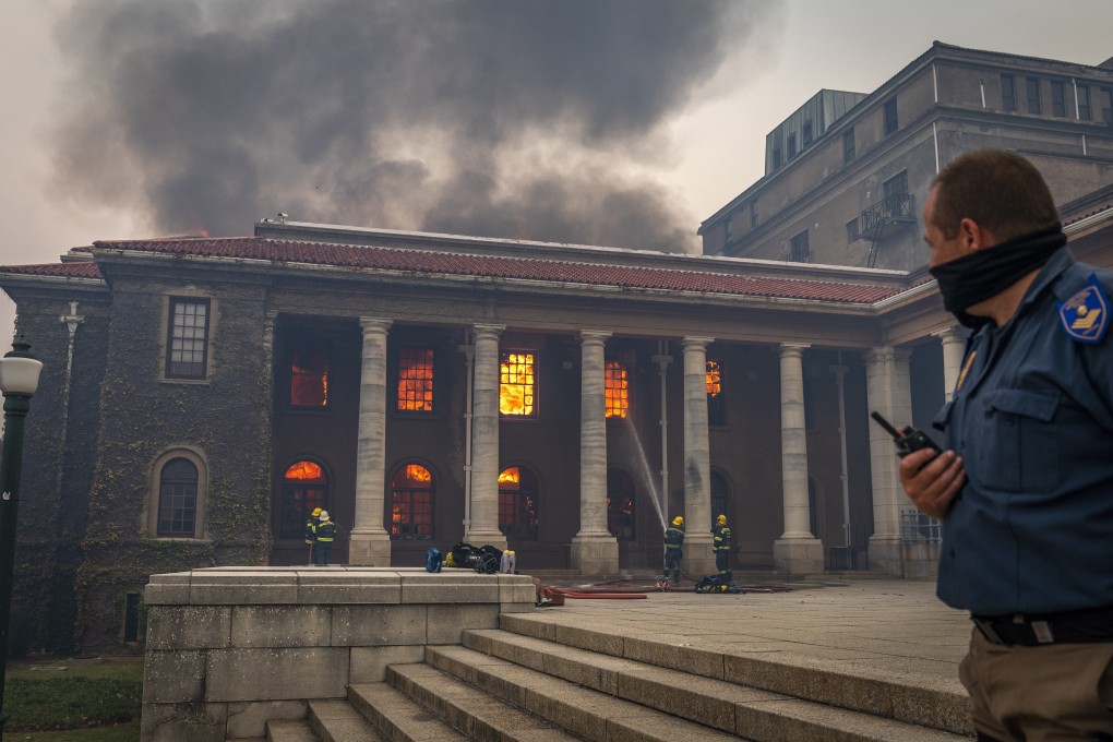Firefighters battle a blaze that destroyed the nearly 200-year-old Jagger Library on the University of Cape Town campus in Cape Town, South Africa on Sunday. Photo: EPA-EFE