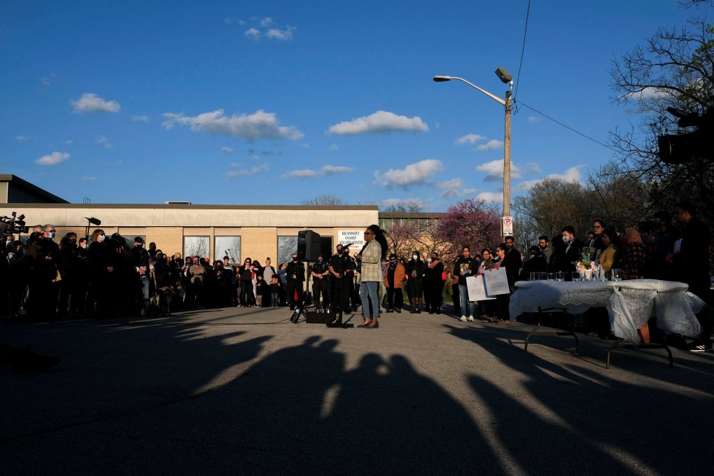 Friends, family and community members gather for a candlelight vigil in Krannert Park in Indianapolis to remember the victims of a mass shooting at a local FedEx facility. Photo: AFP