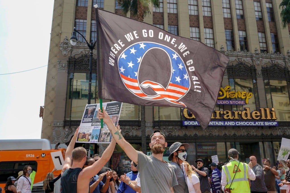 QAnon demonstrators protest child trafficking on Hollywood Boulevard in Los Angeles, California. Photo: AFP