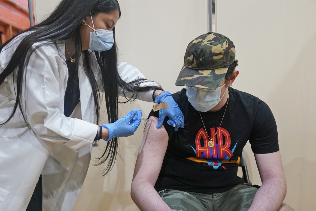 A man receives the Pfizer Covid-19 vaccine in West New York, US. Photo: AP