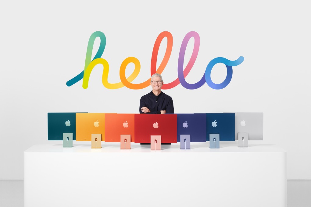 Apple CEO Tim Cook with the all-new iMac lineup announced during a special event at Apple Park in Cupertino, California, US, on April 20, 2021. Photo: Handout