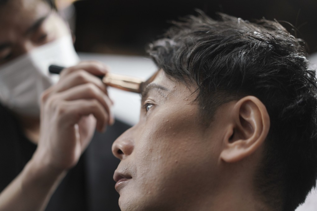 Yoshihiro Kamichi, a 44- year-old Japanese businessman, gets make-up applied at Ikemen-Works. Photo: AP