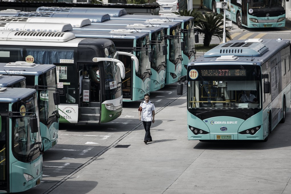 An electric bus arrives at a public transport hub in Shenzhen, China, in 2017. China is ahead of Hong Kong and the rest of the world in the shift to electric transport. Photo: Bloomberg