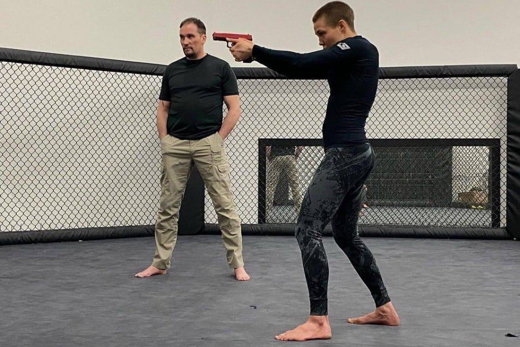 Rose Namajunas uses a firearm during her training ahead of UFC 261.Photo: Instagram/@rosenamajunas