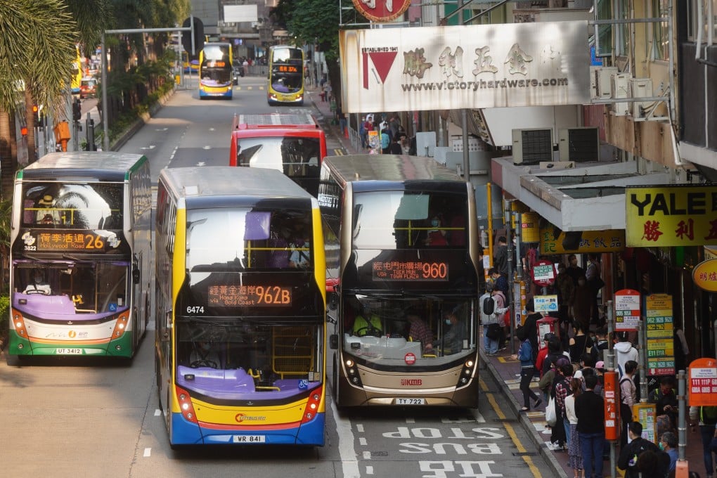 People queue up for buses in Wan Chai on March 15. Public transport vehicles are a glaring omission in Hong Kong’s electric vehicle road map. Photo: Sam Tsang