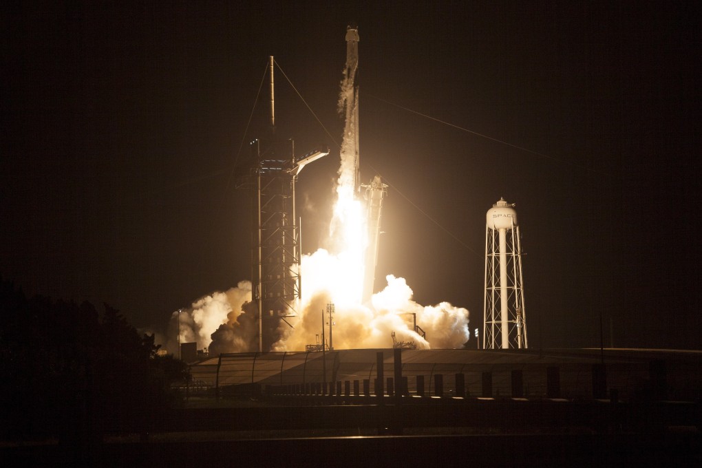 A SpaceX Falcon 9 rocket carries the company’s Crew Dragon spacecraft. Photo: EPA