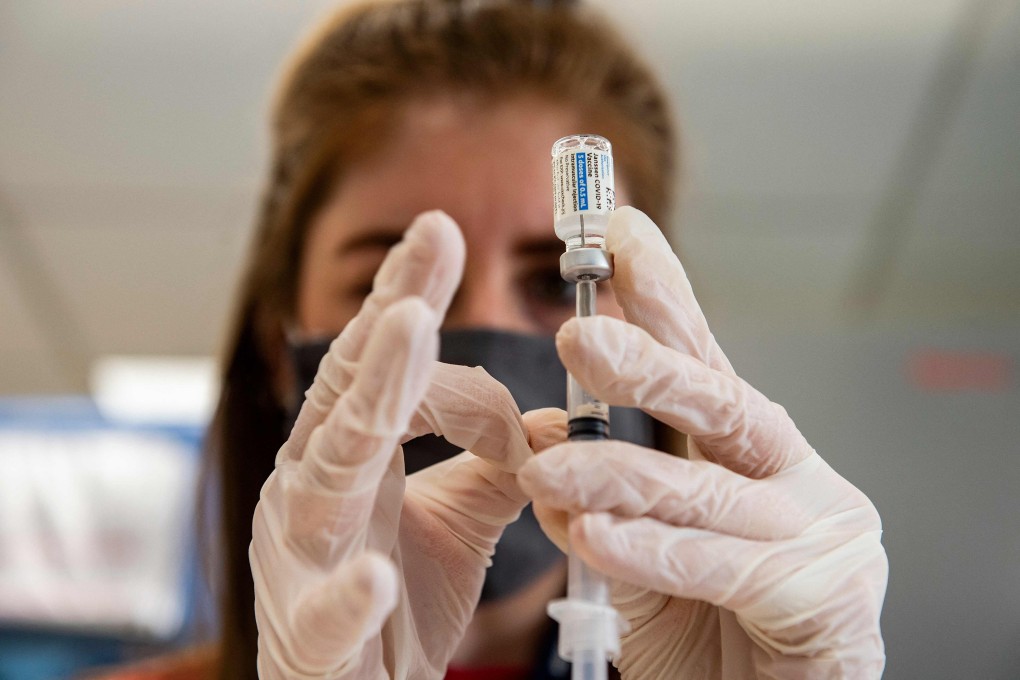 A pharmacist fills syringes with the Johnson & Johnson vaccine at a medical centre in Boston, Massachusetts, in March. Photo: AFP