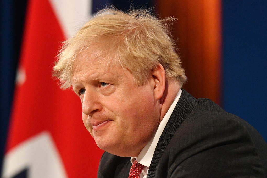 Britain’s Prime Minister Boris Johnson takes part in an international climate summit via video link on Friday. Photo: DPA