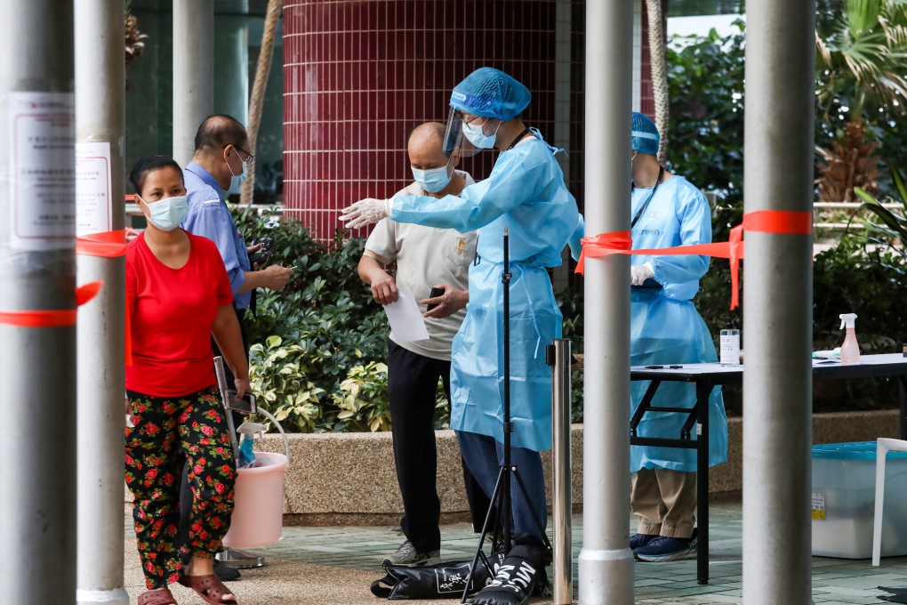 Medical staff at a building lockdown earlier this week. Photo: Jonathan Wong
