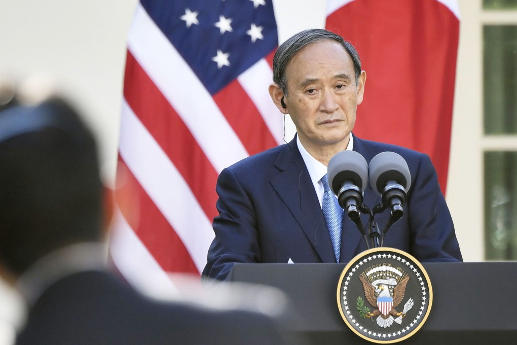 Japanese Prime Minister Yoshihide Suga listens to a question from a reporter during a joint press conference with US President Joe Biden at the White House in Washington this month. Photo: Kyodo