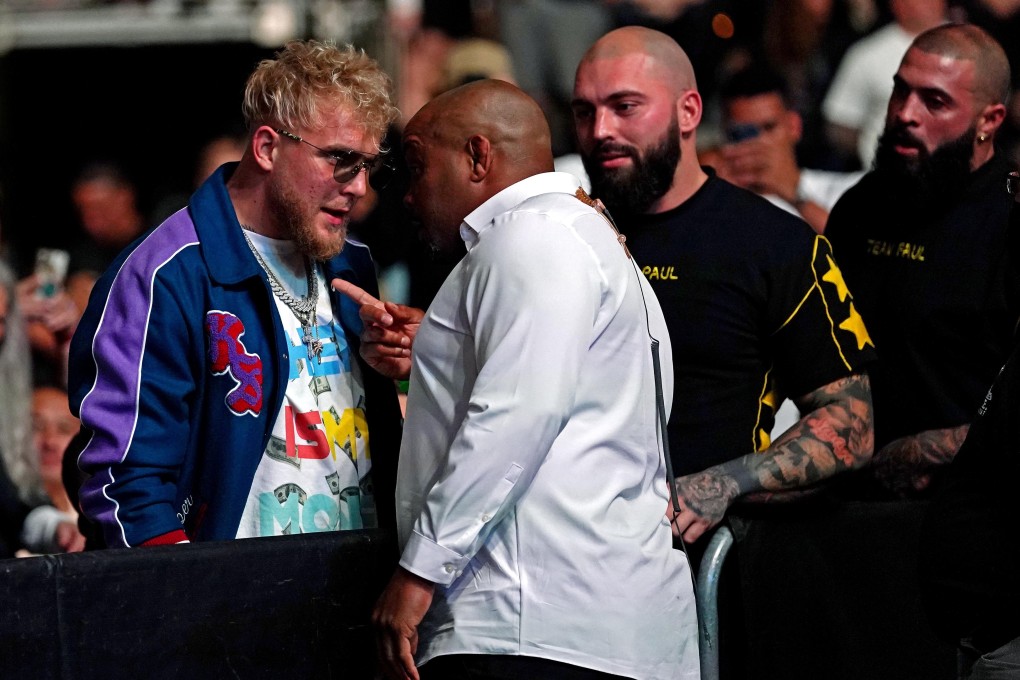 YouTube star Jake Paul is confronted by UFC ringside announcer Daniel Cormier at UFC 261 Photo: Jasen Vinlove-USA TODAY Sports