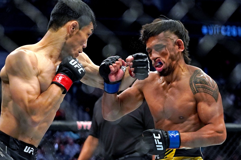 Danaa Batgerel lands a check left hook on Kevin Natividad at UFC 261. Photo: Jasen Vinlove/USA TODAY Sports