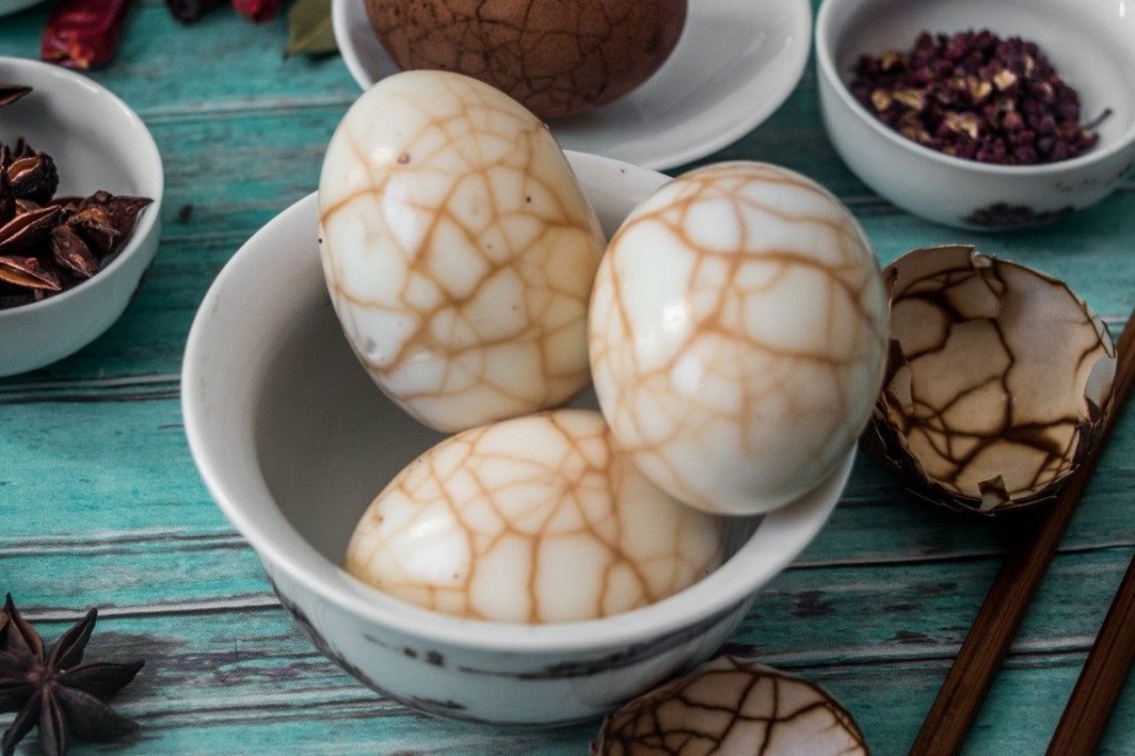 Tea eggs, along with some of the spices used to make the broth. Photo: Shutterstock