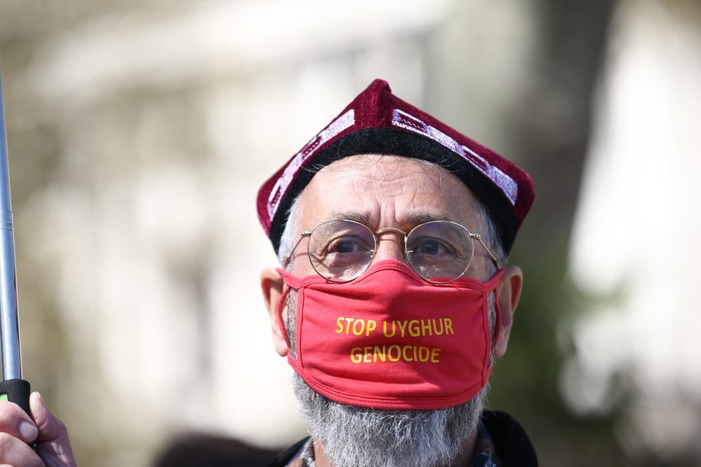 A man joins a demonstration at Parliament Square in London on April 22, held ahead of a House of Commons debate on whether Uygurs in China’s Xinjiang region are suffering crimes against humanity and genocide. Photo: PA Wire / dpa