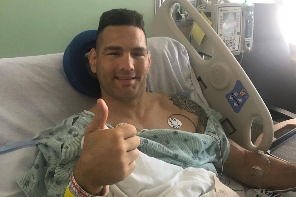 Chris Weidman gives a thumb up from his hospital bed after surgery on his broken leg. Photo: Instagram/@mrsweidman