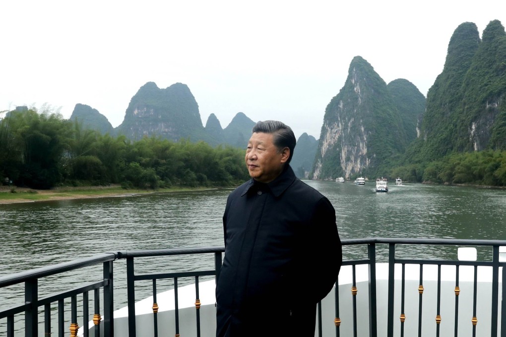 Chinese President Xi Jinping visits the Li River to learn about local conservation efforts. Photo: Xinhua