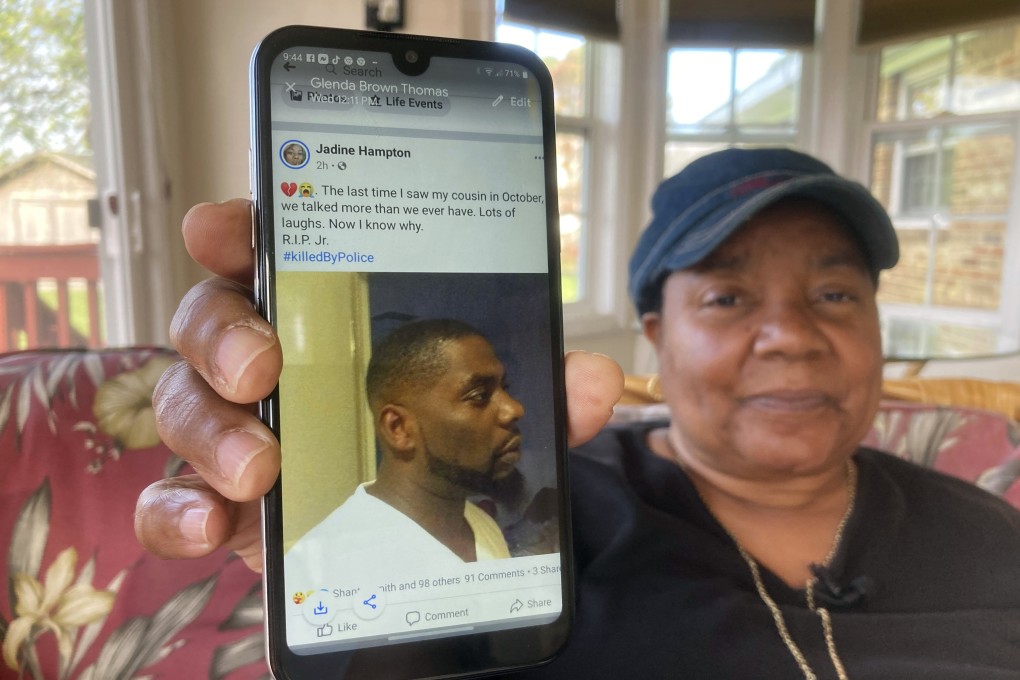 Glenda Brown Thomas shows a photo of her nephew, Andrew Brown Jnr, who was was shot and killed by sheriff’s deputies. Photo: AP
