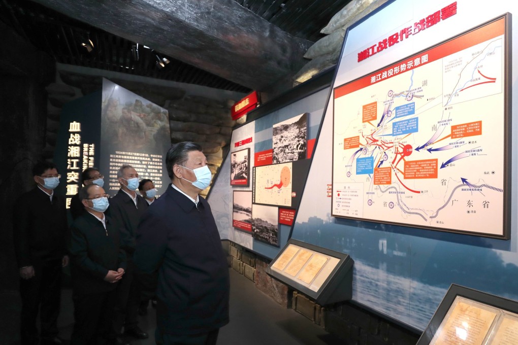 Xi Jinping inspects a display dedicated to the Battle of Xiangjiang. Photo: Xinhua