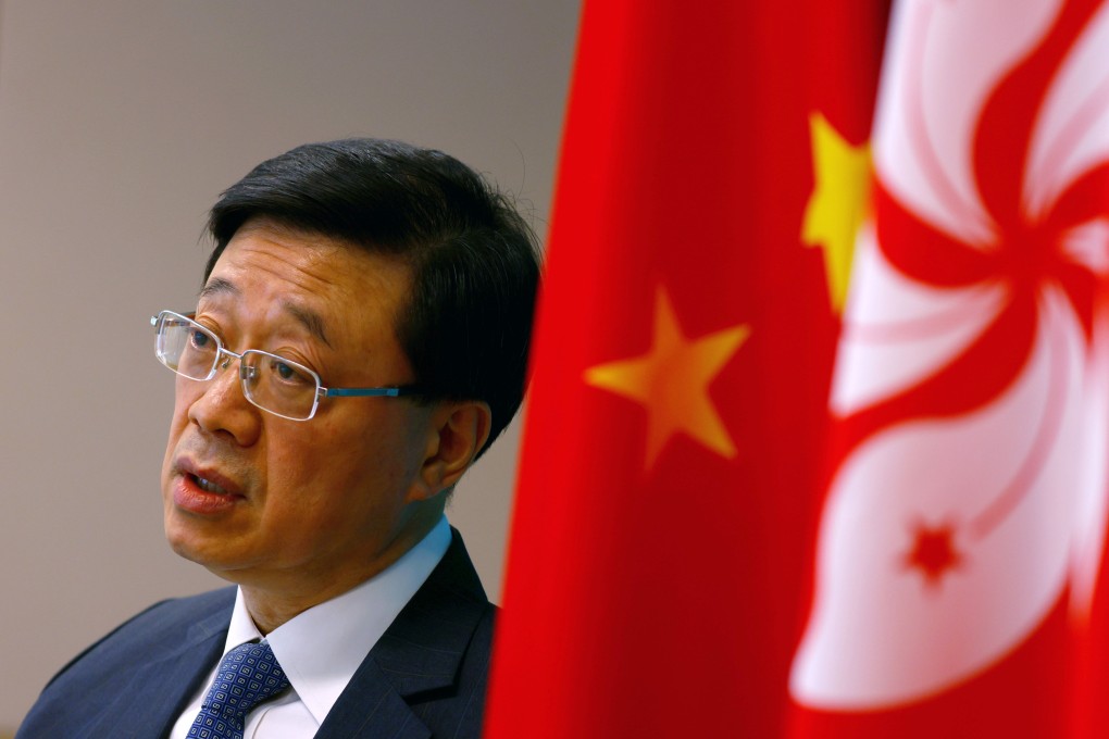 Security chief John Lee has promised that a new immigration law aimed at asylum seekers will not allow authorities to block people from leaving Hong Kong. Photo: Nora Tam