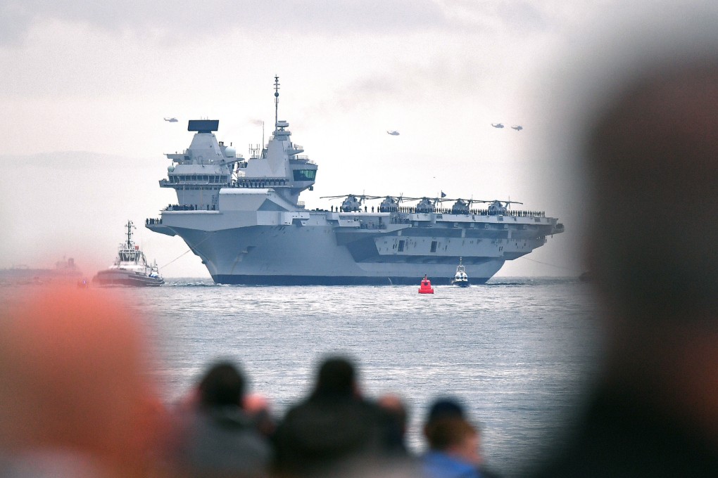 HMS Queen Elizabeth will be joined on her maiden deployment by two destroyers, two frigates, a nuclear submarine and two logistics vessels from the Royal Navy. Photo: AFP