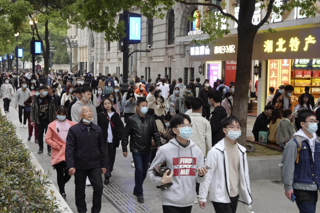 A crowded street in Wuhan on April 4, about a year after the city’s coronavirus lockdown was lifted. China’s census has reportedly found the nation’s population has declined. Photo: Kyodo