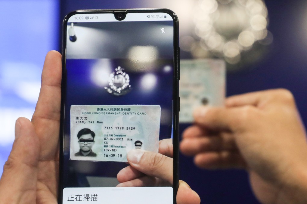 A new app will allow Hong Kong police to scan ID cards and instantly check them against a central database. Photo: Xiaomei Chen
