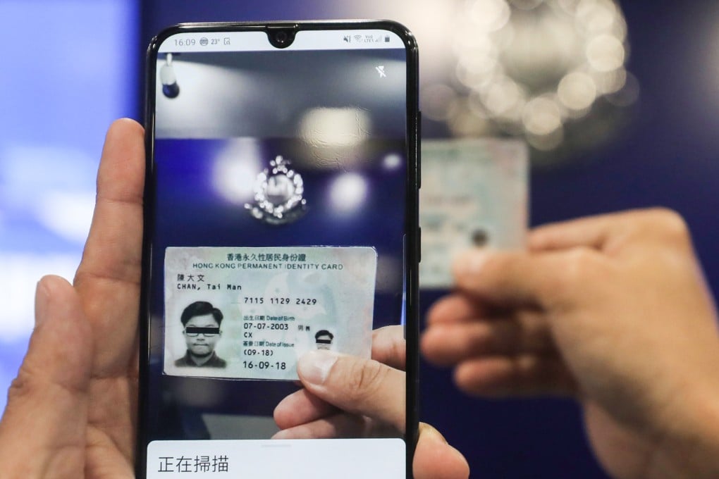 A new app will allow Hong Kong police to scan ID cards and instantly check them against a central database. Photo: Xiaomei Chen