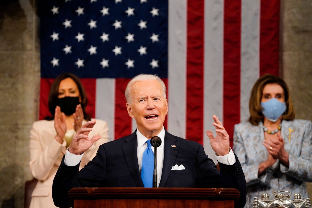 US Vice-President Kamala Harris (L) and Speaker of the House Nancy Pelosi (R) applaud as US President Joe Biden addresses Congress. Photo: AFP