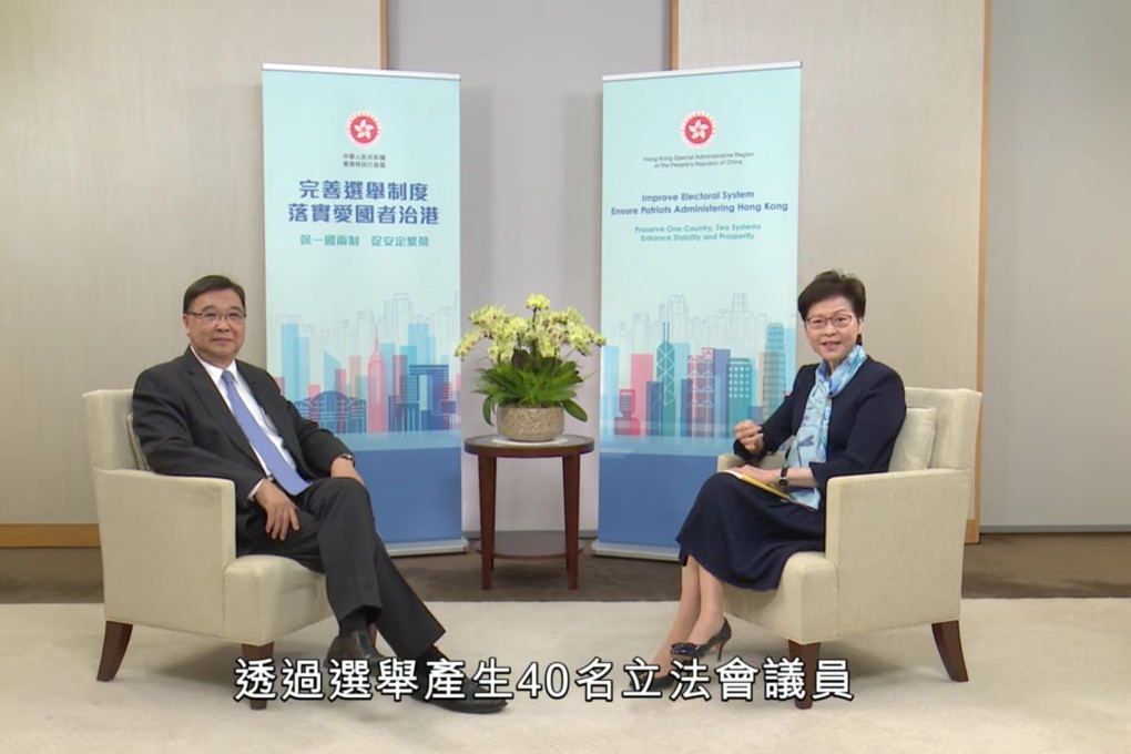 Carrie Lam talks to Professor Wong Yuk-shan, a local deputy to the National People’s Congress. Photo: Handout