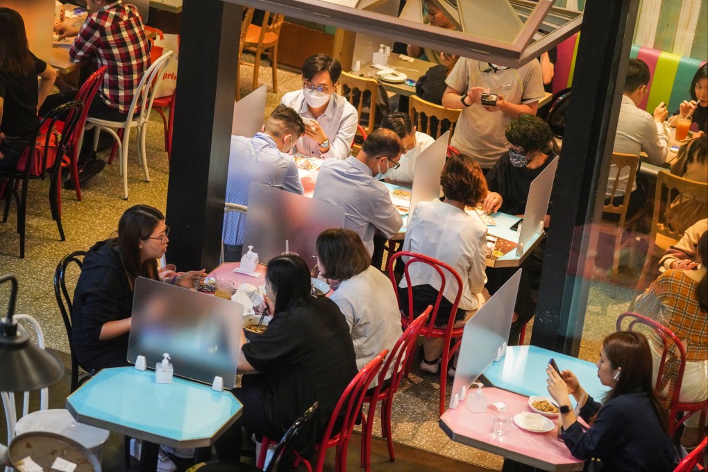 Lunch at a restaurant in Hong Kong’s Ming Kok district. With at least four ways for restaurants to operate, enforcing the new rules will be an issue. Photo: Winson Wong